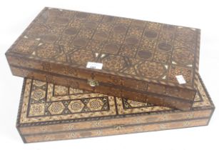 Two backgammon board game sets.