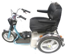 A TGA three wheel mobility scooter. Model no. 1101050, s/n. 725440 comes with charger. Max.