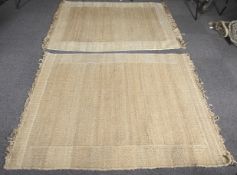 Two coarse woven rugs.