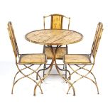 A bamboo effect round cafe table and three folding chairs.