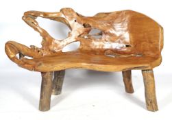 A solid wood one piece bench.