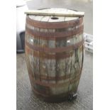 A vintage coopered wooden beer barrel.