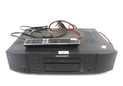 A Marantz CD player. Model CD6004, s/n. 15001149006523 with remote.