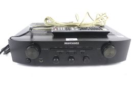A Marantz amplifier. Model PM6004, s/n. 15001150005800 with remote.