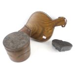 A wooden pot and cover, a pair of bellows and a printing block. Max.