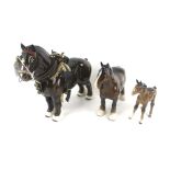 Three Beswick figures of horses. One in riding attire, Max.