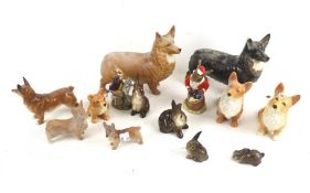 A collection of corgi dog figures. By Doulton, Sylvac, Beswick etc. Max.