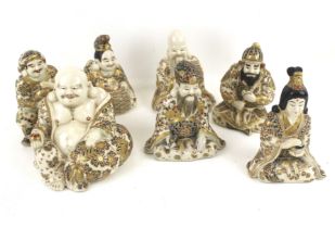 Seven Japanese signed ceramic figures.