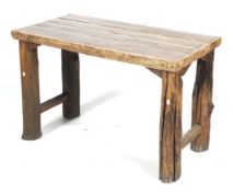 A rustic solid hardwood table.