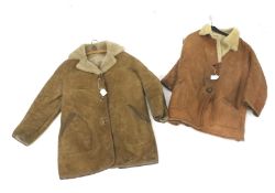 Two vintage sheepskin coats.