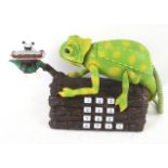 A novelty Karma Chameleon telephone.