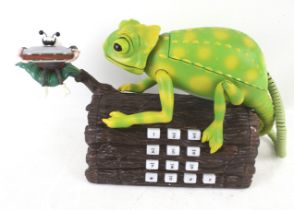 A novelty Karma Chameleon telephone.