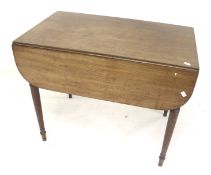 A Victorian mahogany drop leaf table. With frieze drawer, raised on turned tapered supports, H66.