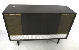 A DECCA radiogram model S.R.G. 707. With Garrard turntable and three band radio.