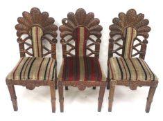 A set of three 20th century chairs.