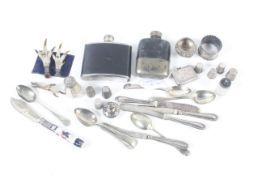 An assortment of silver and white metal.