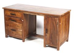 A hardwood twin pedestal desk.