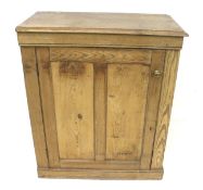 A rustic pitch pine cabinet.