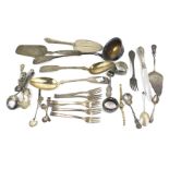 An assortment of silver, white metal and silver plated flatware.