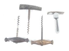 Four vintage corkscrews.