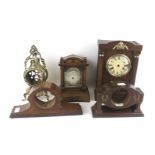 Five 19th century and later mantle clock cases.