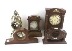 Five 19th century and later mantle clock cases.