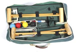 A Jaques of London croquet set in a carry bag. Including four mallets, four balls, etc.