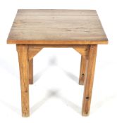 A hardwood square top table.