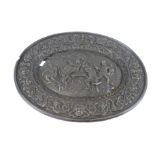 A cast metal oval Husquvana wall plaque.