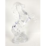 A Waterford crystal prancing horse ornament.