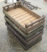Four wooden apple crates