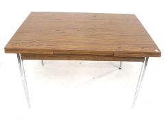 A French 1960s draw leaf table with tapering chrome legs.