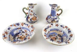 A pair of Masons Ironstone octagonal serpent jugs with matching bowls.