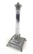 A chrome Corinthian column electric lamp base.