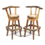 A pair of solid hardwood bar stools.