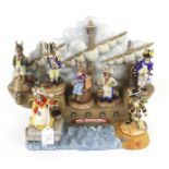 A Royal Doulton 'HMS Bunnykins' ship and seven shipmate figures.