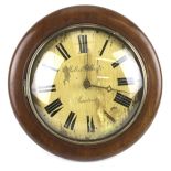 A Victorian circular wall clock.