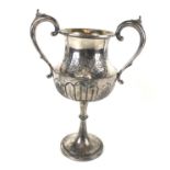 A silver plated twin-handled trophy.