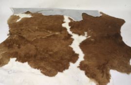 A cow hide rug.