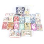 A collection of assorted vintage children's card games.