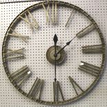 A contemporary large battery operated wall clock.