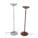 Two retro patio heaters with adjustable telescopic stands.