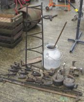 Quantity of assorted metal items including flat irons, kettles, etc.
