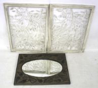 A framed wall mirror and a pair of metalwork panels. The panels featuring floral decoration. Max.
