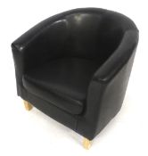 A contemporary black leatherette tub chair.