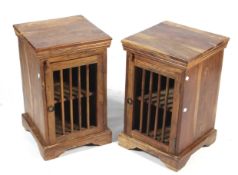 A pair of hardwood bedside cabinets. With barred window doors, L.