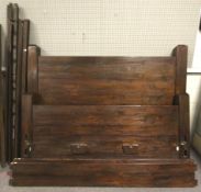 A hardwood super king size double bed.