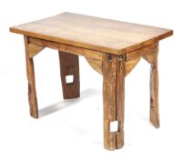 A small hardwood rectangular table.