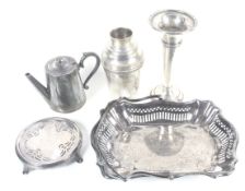 Five pieces of silver-plate. Including a fruit basket, shaker, trumpet vase, etc. Max.
