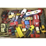 An assortment of playworn diecast vehicles.